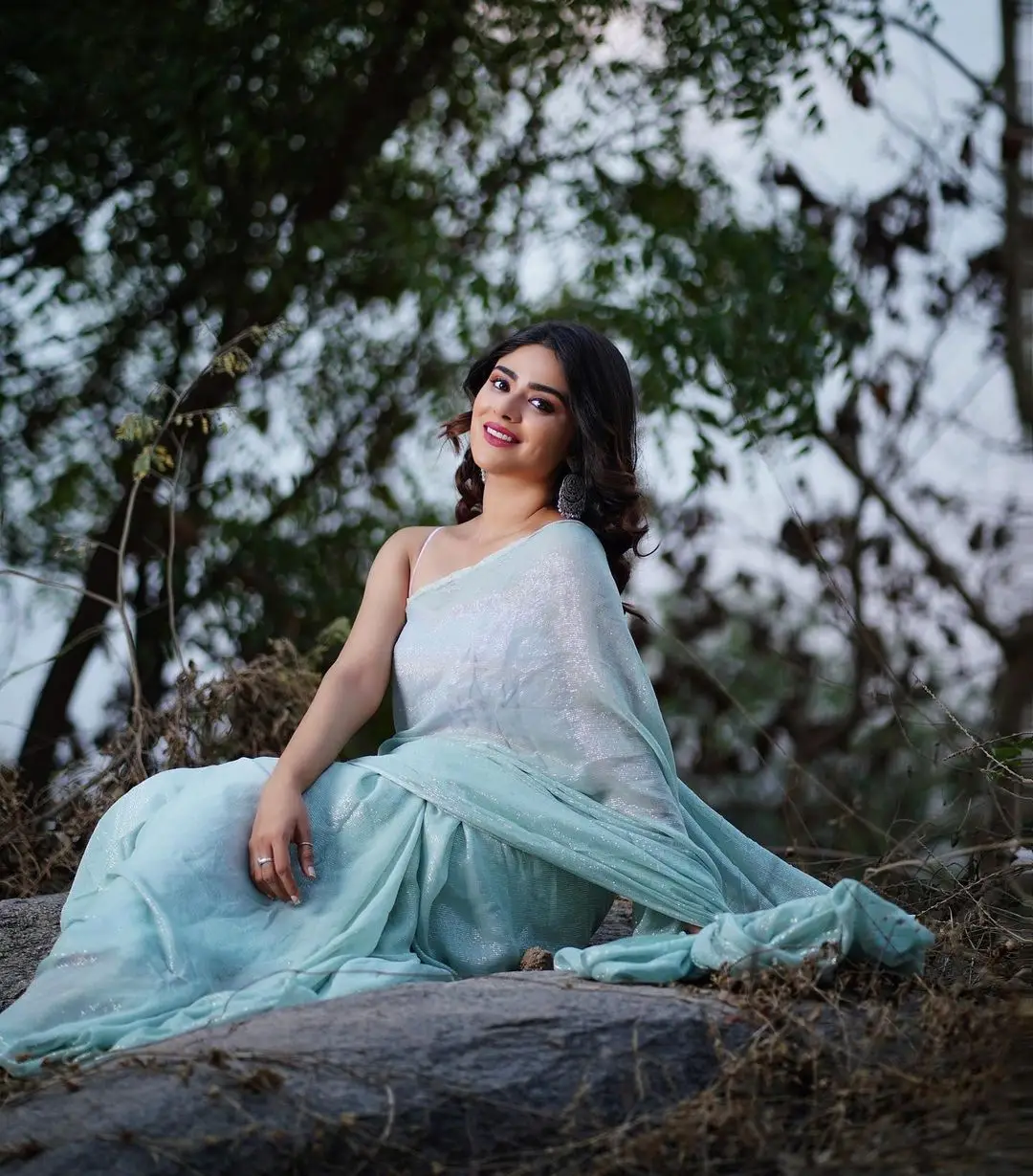 Priyanka Sharma Stills In Blue Saree Sleeveless Blouse